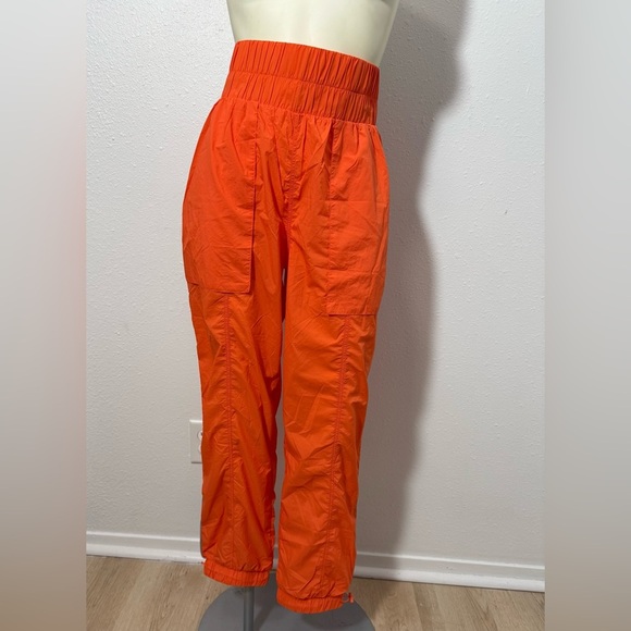 NWT Fabletics High-Waisted Piped Nylon Pant in Passion Orange - Picture 1 of 12